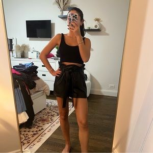 Amanda Uprichard black leather shorts with pleated waist detail and belt